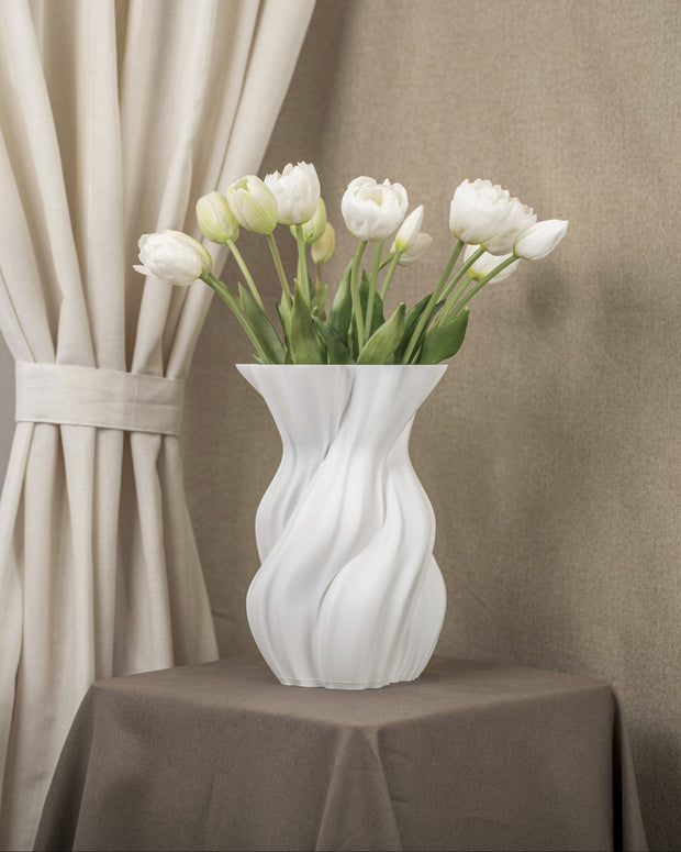 Vintervad Design Anna white sculptural vase with organic twisted lines, made from sustainable biodegradable materials.