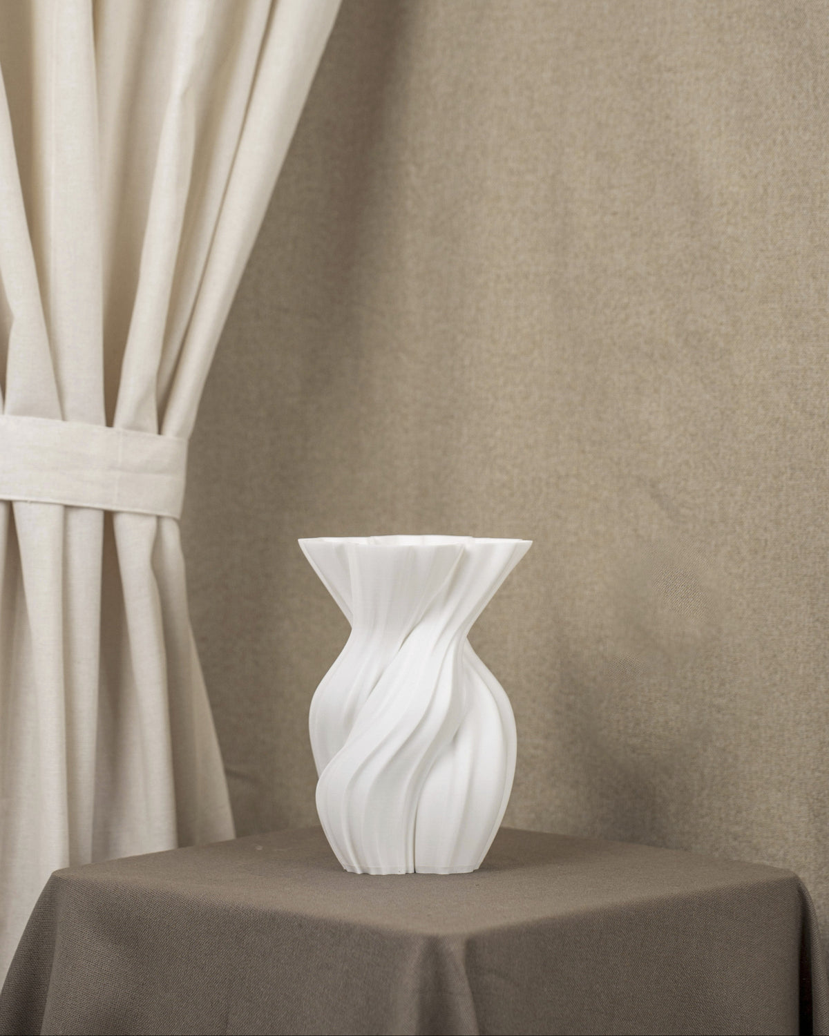 Vintervad Design Anna white sculptural vase with organic twisted tree-inspired lines made from sustainable materials.