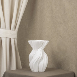 Vintervad Design Anna white sculptural vase with organic twisted tree-inspired lines made from sustainable materials.