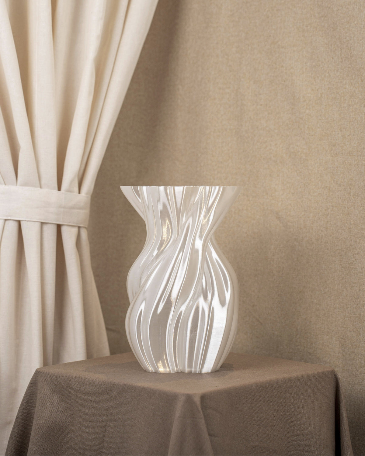 Vintervad Design Anna white sculptural vase with organic twisted tree-inspired lines made from sustainable materials.