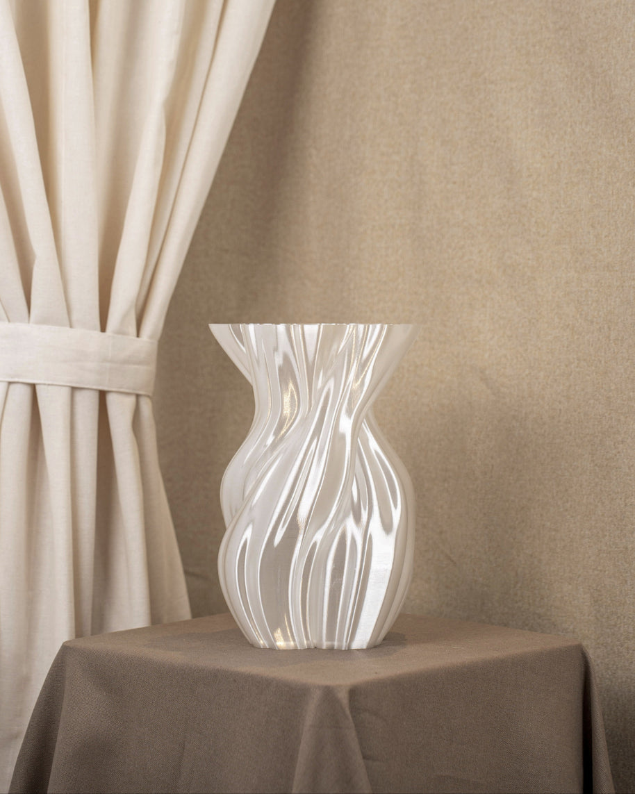 Vintervad Design Anna white sculptural vase with organic twisted tree-inspired lines made from sustainable materials.