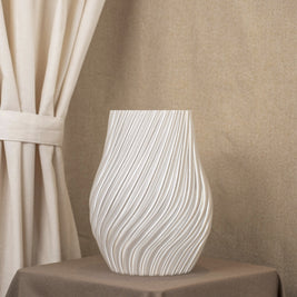 Vintervad Design Ida vase in clear, featuring a modern spiral design made from sustainable corn harvest waste.