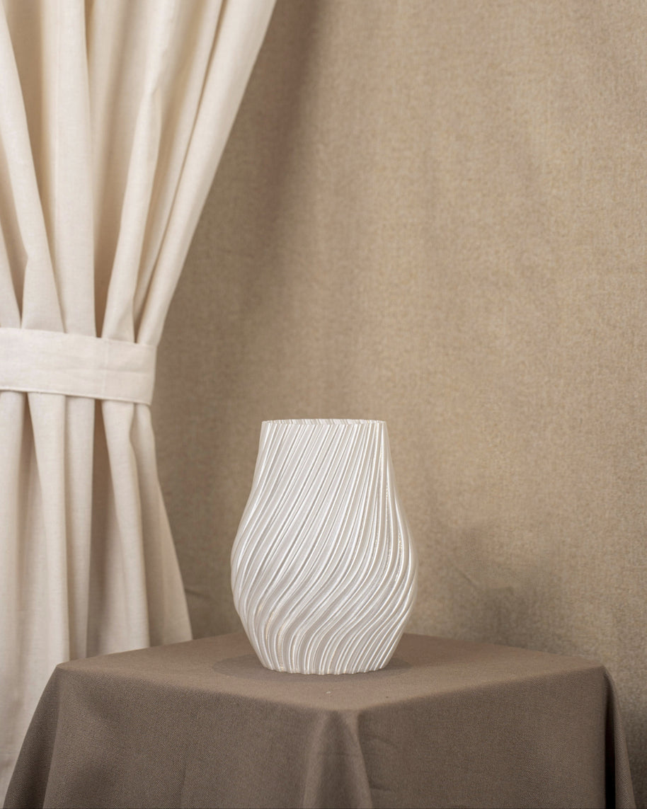 Vintervad Design Ida vase in clear, featuring a modern spiral-textured design made from sustainable corn harvest waste.