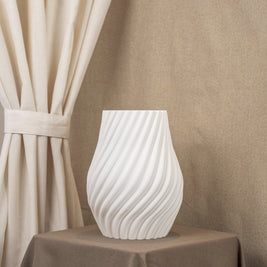 Vintervad Design Ida vase in white with a modern spiral texture, made from sustainable, biodegradable materials.